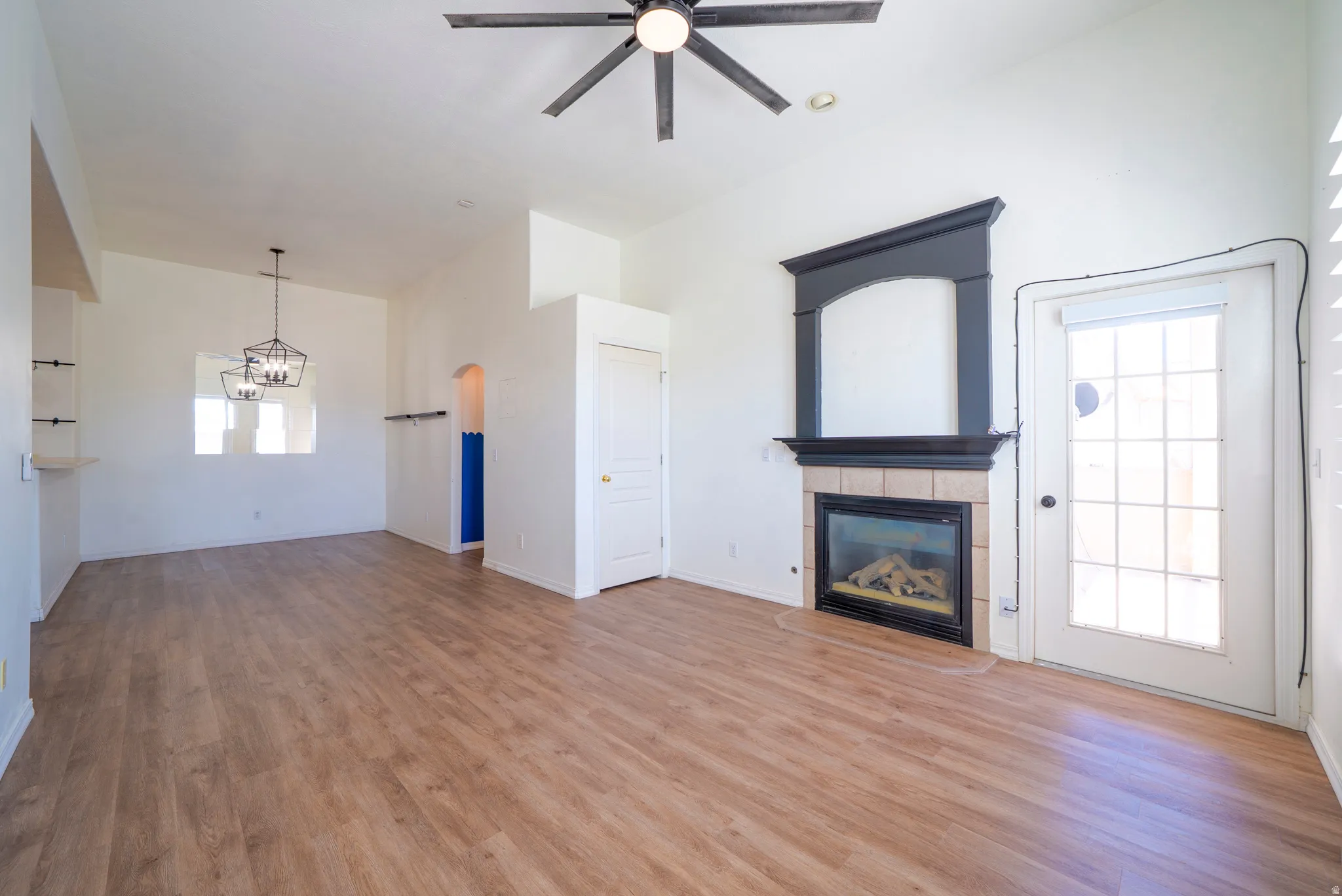Living room with door to private balcony