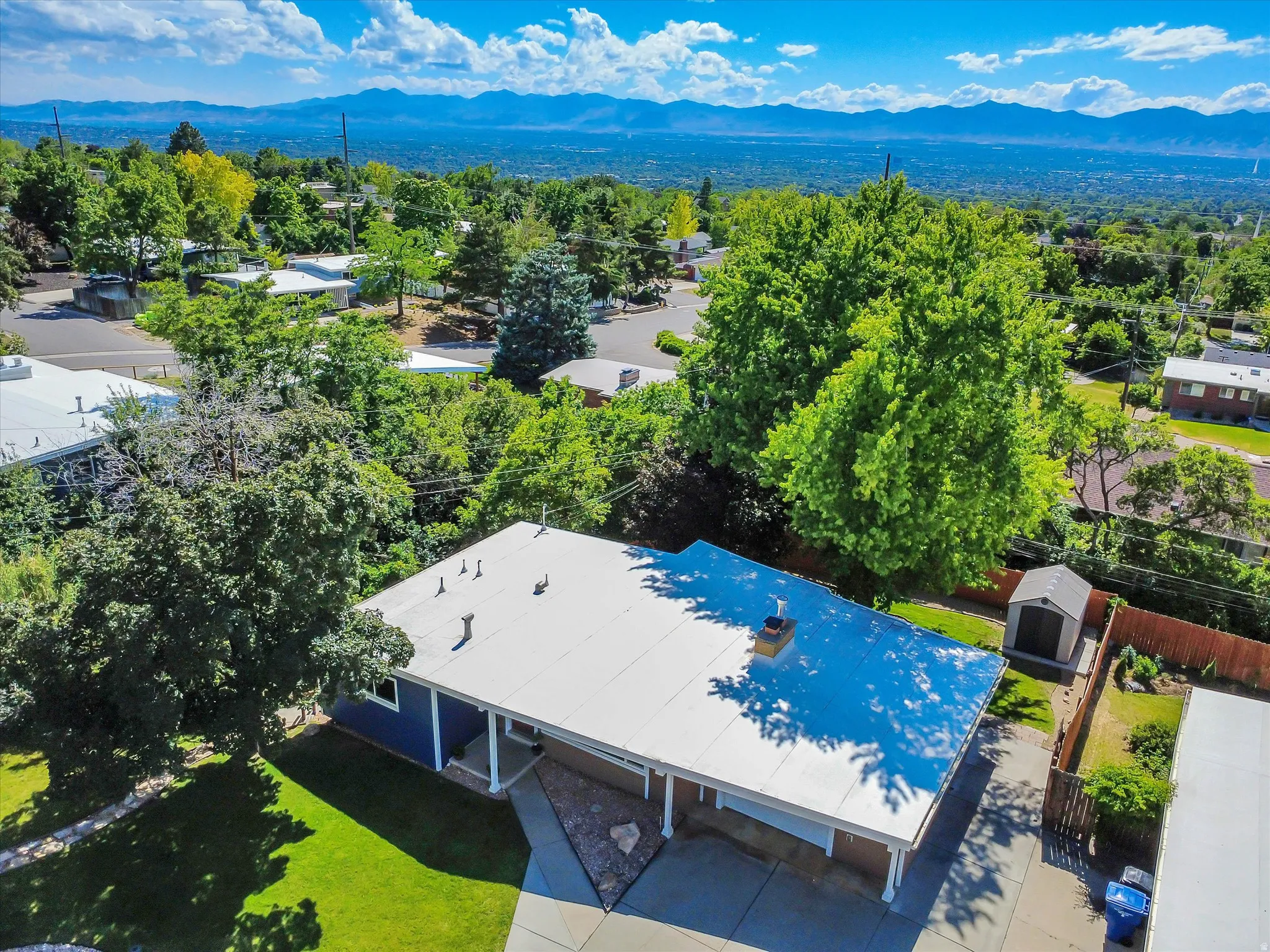 Aerial perspective showcasing the residential area with distant mountains