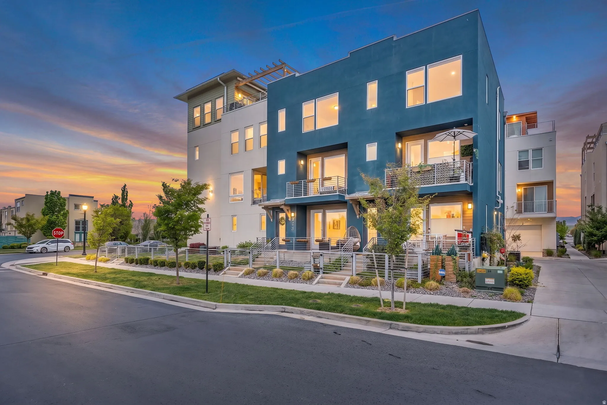 Modern multi-story facade featuring a striking blue and white exterior