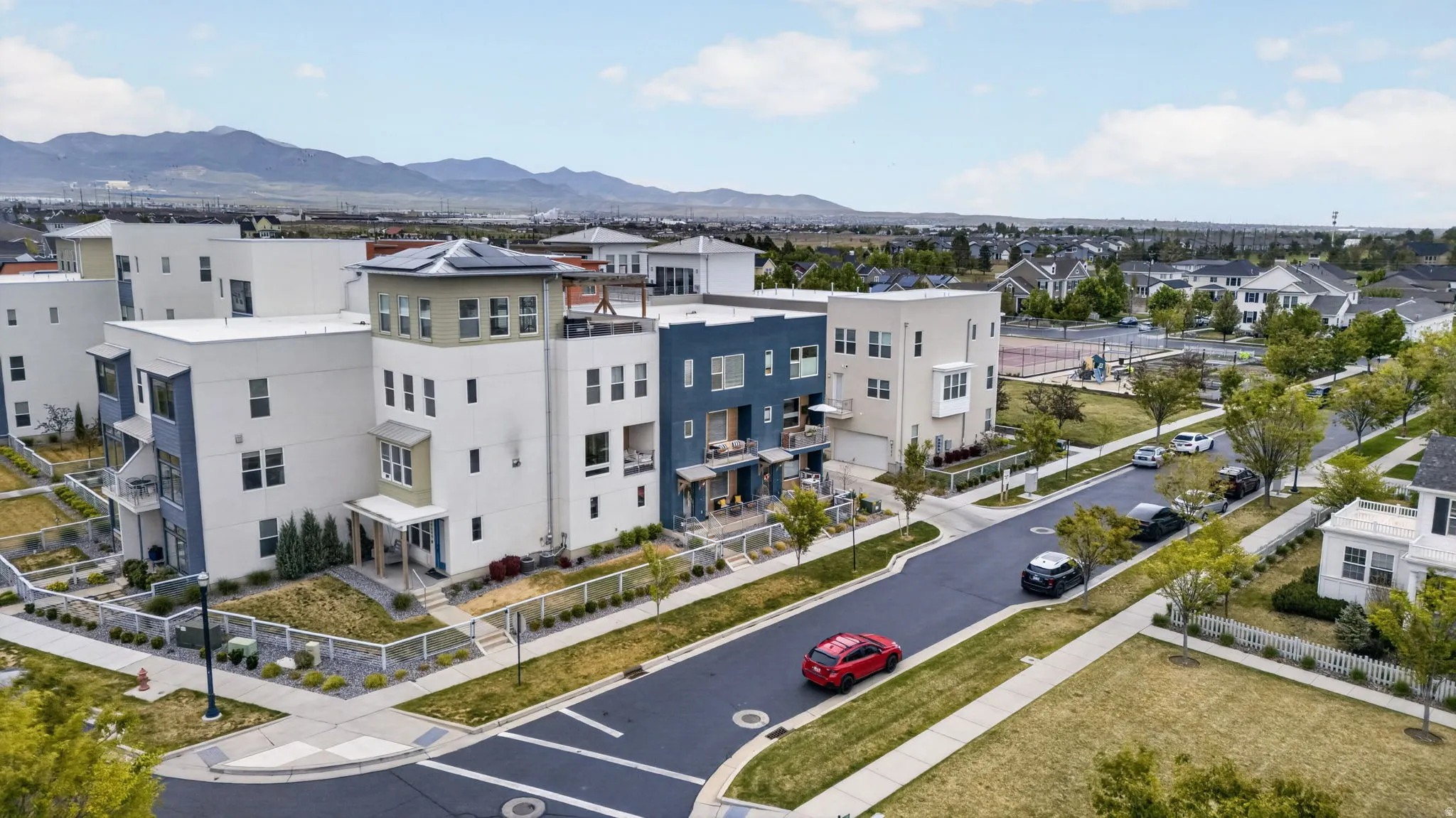 Contemporary townhome community featuring multi-story residences