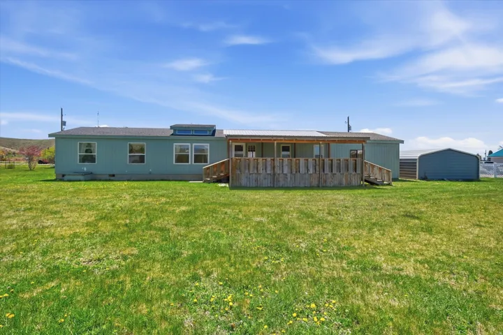 Expansive green lawn providing a substantial outdoor area