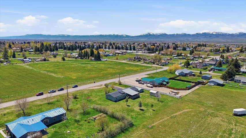 Aerial depiction of a residential area featuring multiple single-story structures