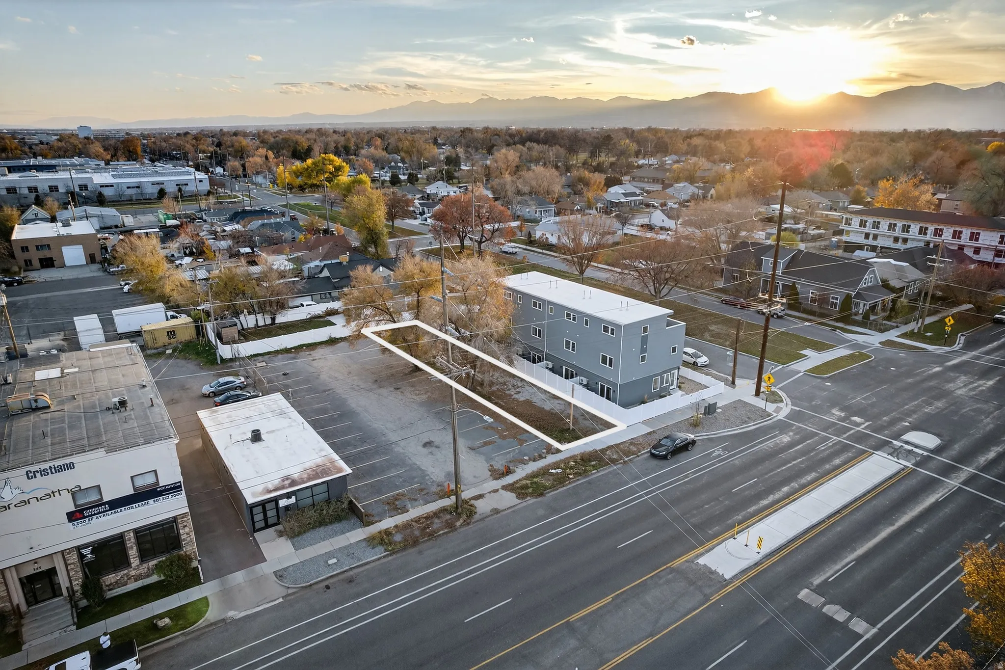 Aerial perspective showcasing an urban lot with defined boundaries