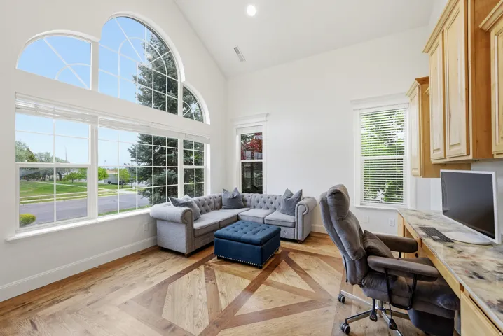Vaulted ceiling with arched windows and lower transom windows