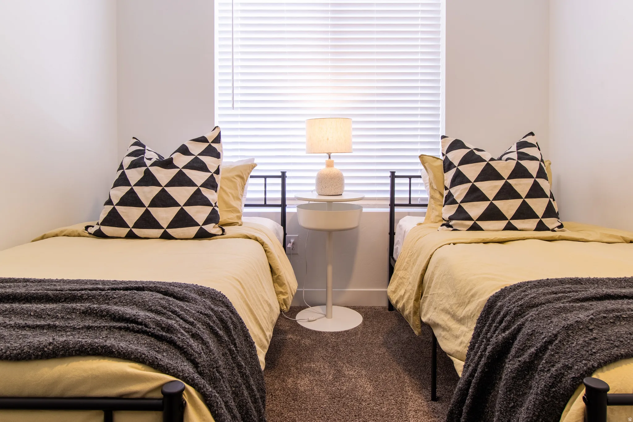 Good size bedroom with large window for natural light, high quality vinyl blinds, walk in closet.