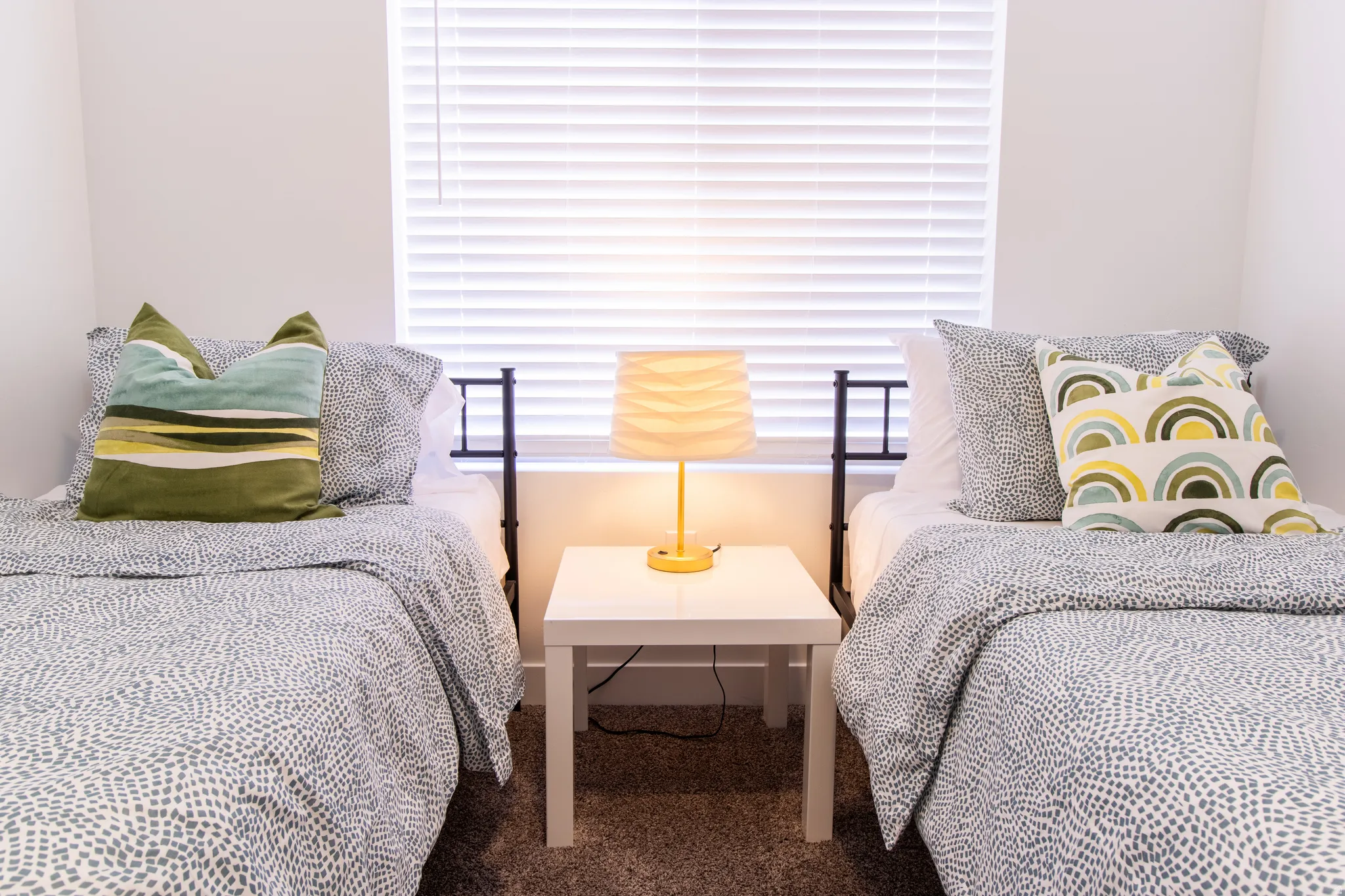 Good size bedroom with large window for natural light and high quality vinyl blinds
