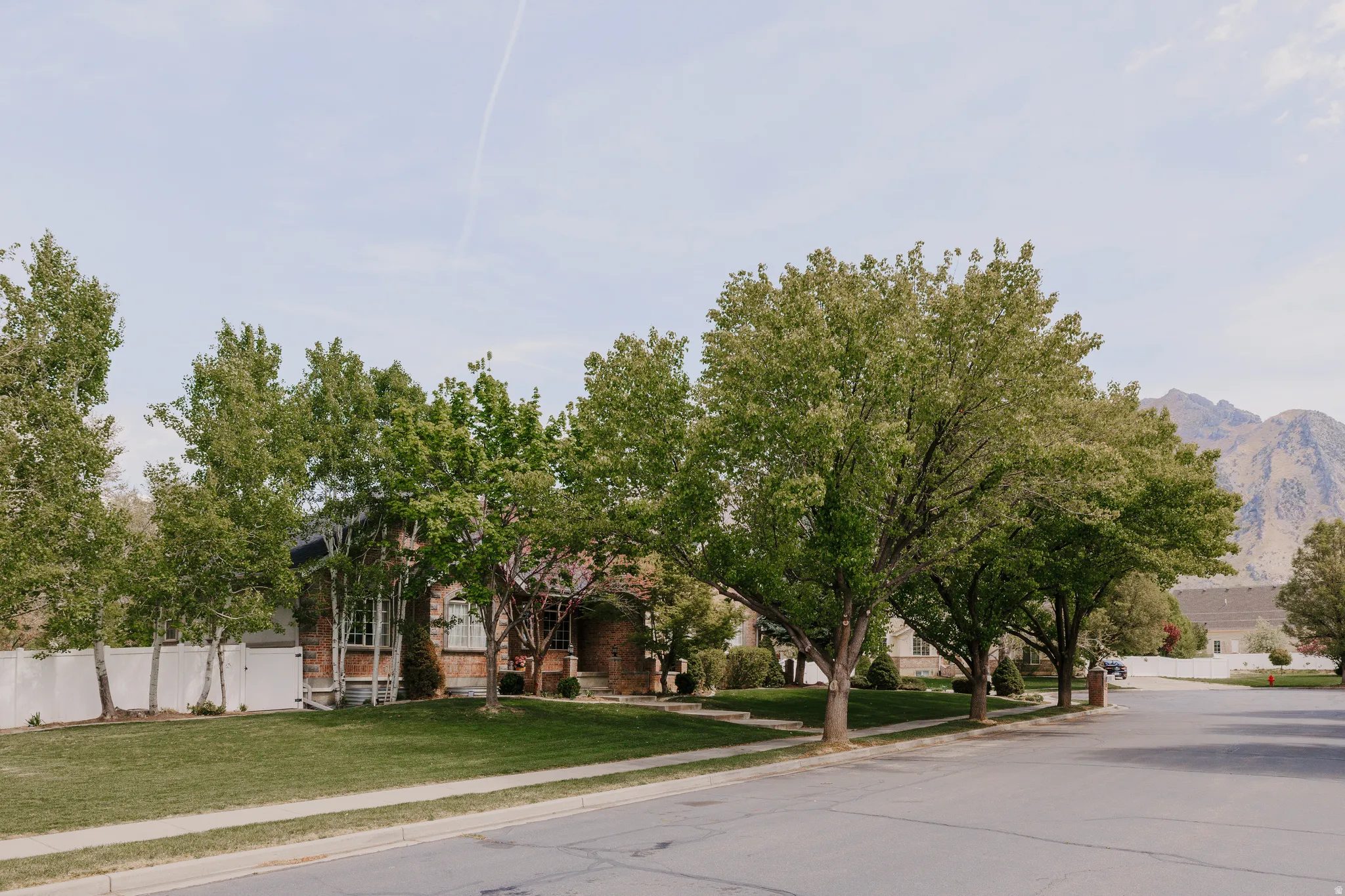 View of front of house with brick siding