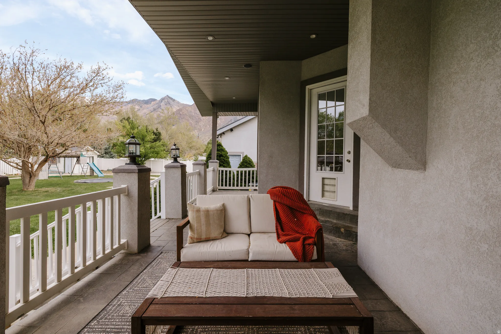 Balcony with a mountain view and a playground