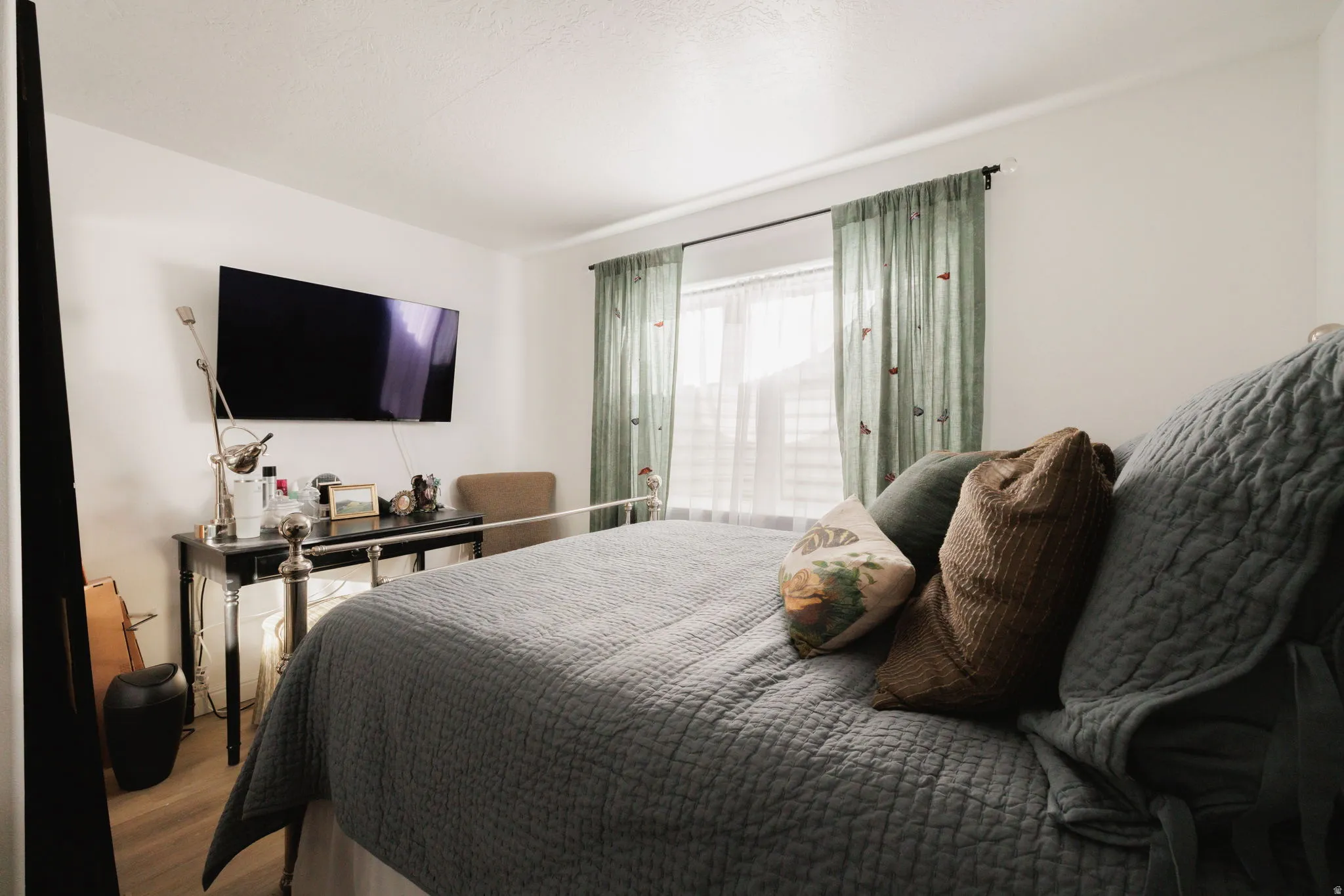 Bedroom with wood finished floors