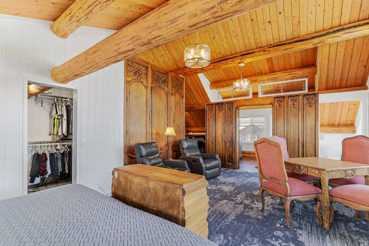 Vaulted wood-paneled ceiling with exposed timber beams and paneling