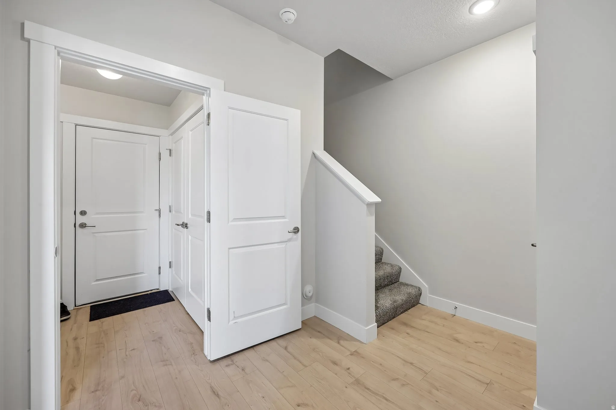Staircase with wood finished floors