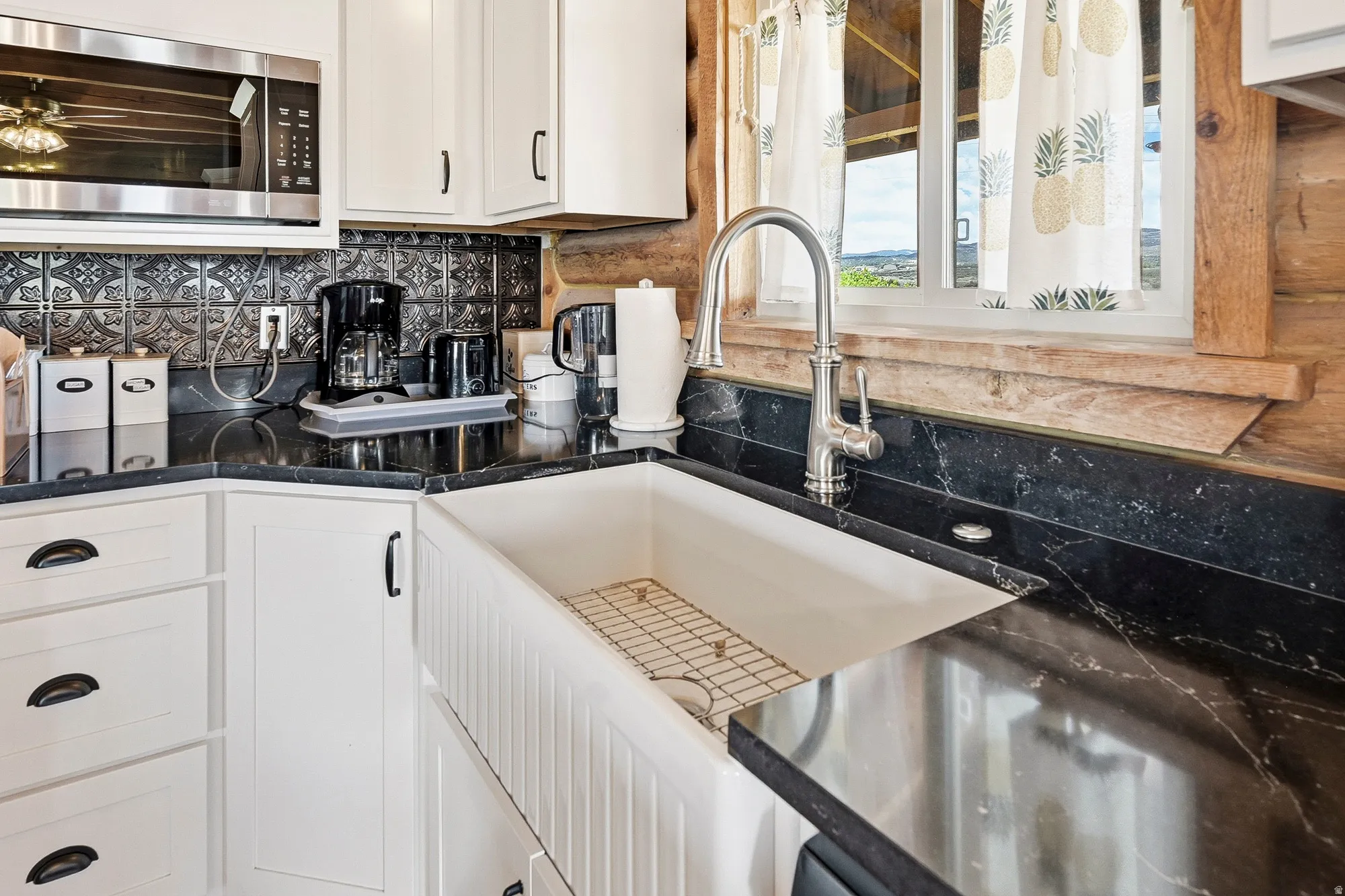 Deep apron front sink with a gooseneck faucet