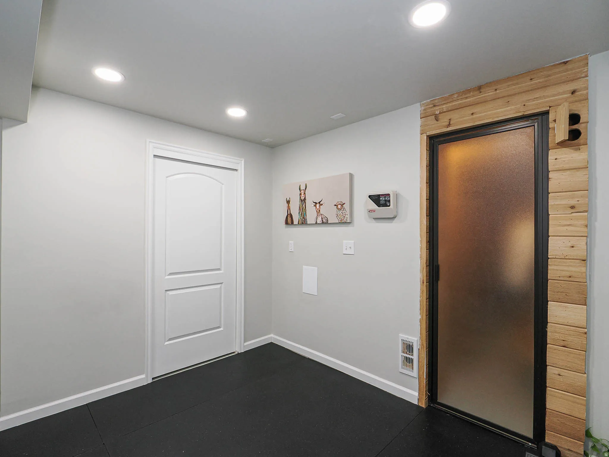 Newer Exercise Room for a Great Workout, a Television Wall-Mount and Durable Flooring All Near Your Relaxing Sauna...AHHHH!!!