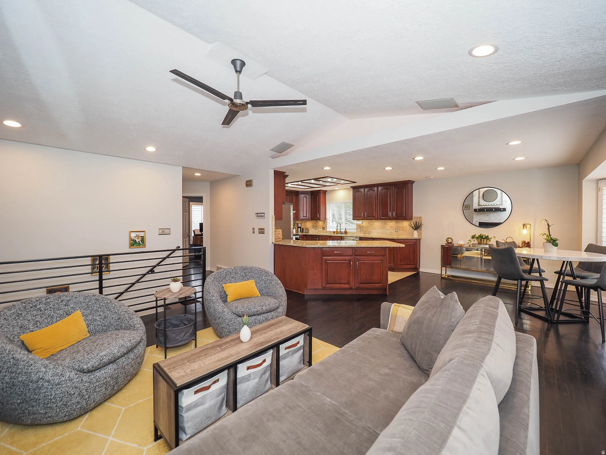 Stunning, Cozy Great Room/Family Room with Newer Marble Fireplace Facade, Awesome Vaulted Ceilings, Recessed Lighting, Stylish Contemporary Ceiling Fan & More!
