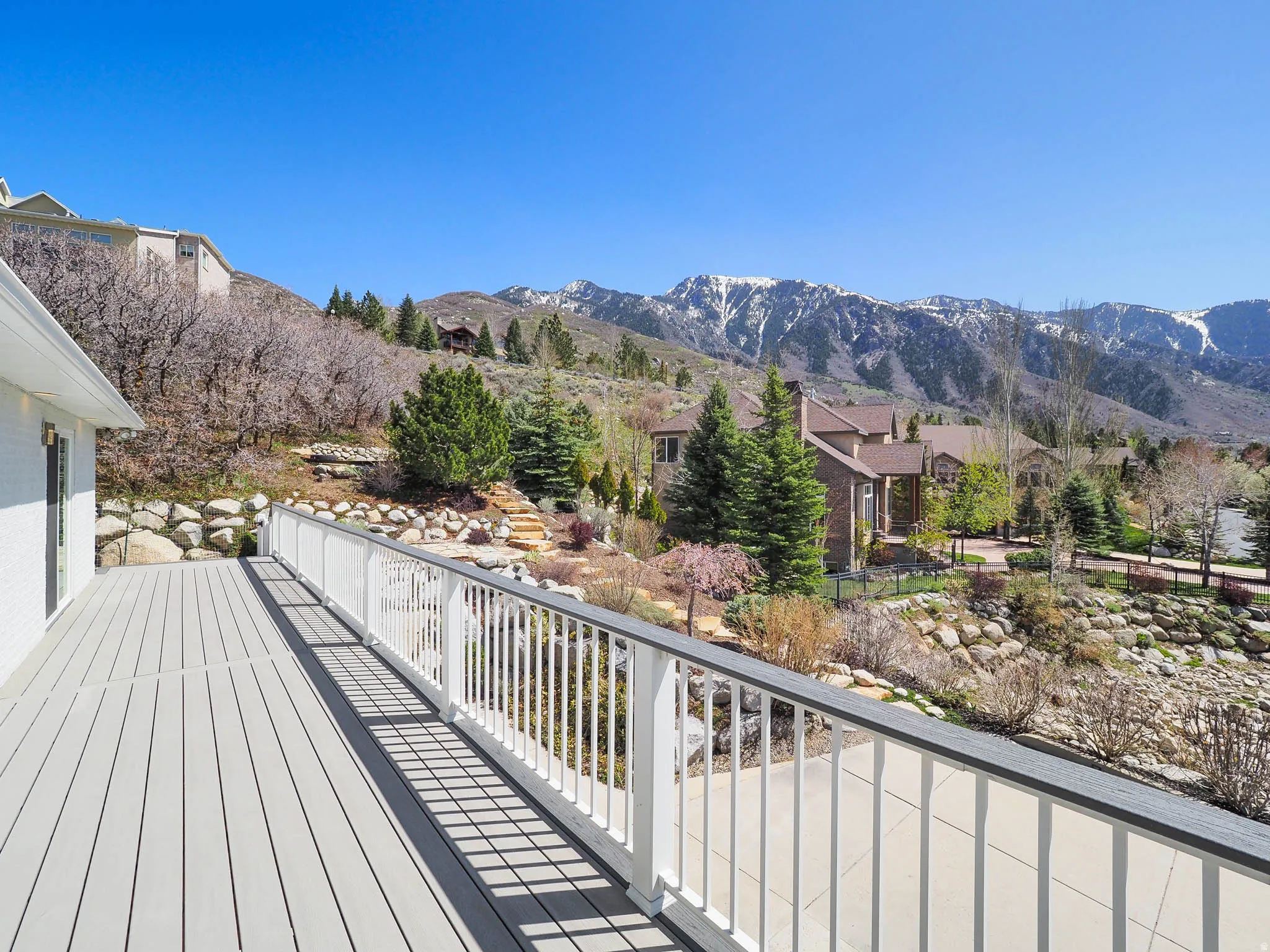 Expansive outdoor deck with incredible views and set against a gorgeous backdrop.