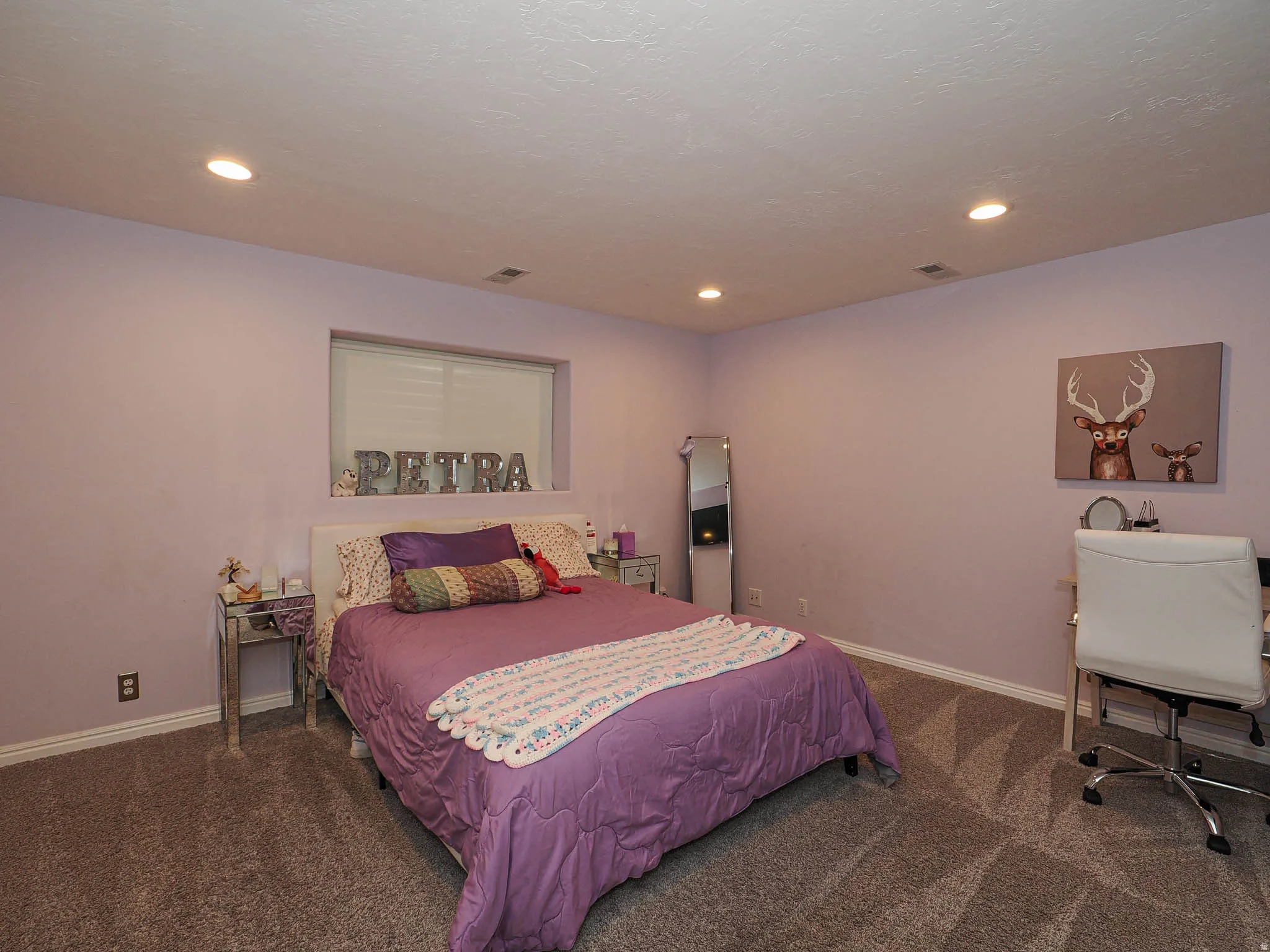 Spacious 4th Bedroom with Recessed Lighting Featuring Plush Carpet Flooring, a Window with Blinds, and Soft Relaxing Wall Tones.