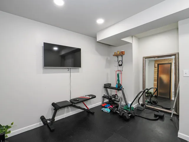 Newer Exercise Room for a Great Workout, a Television Wall-Mount and Durable Flooring All Near Your Relaxing Sauna...AHHHH!!!