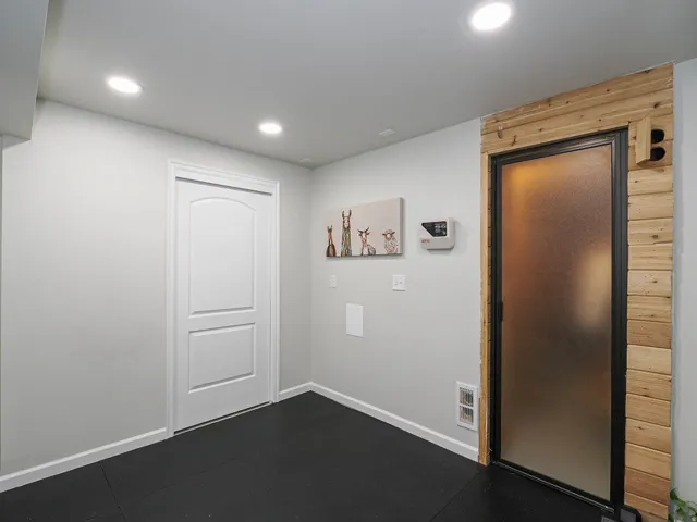 Newer Exercise Room for a Great Workout, a Television Wall-Mount and Durable Flooring All Near Your Relaxing Sauna...AHHHH!!!