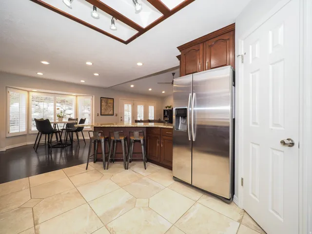 Spacious Kitchen with Beautiful Granite Countertops, Cherrywood Cabinets, Double Ovens, Butler's Pantry, Stainless Steel Appliances, Tap On/Tap Off Faucet & More, Plus, the Refrigerator, Range & Microwave are Included!