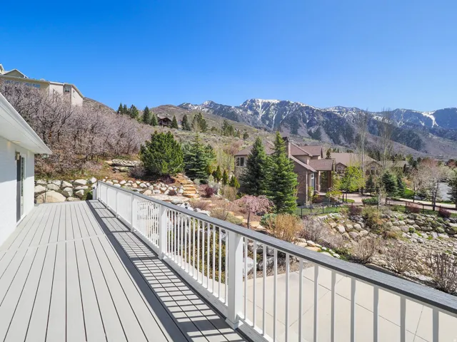 Expansive outdoor deck with incredible views and set against a gorgeous backdrop.