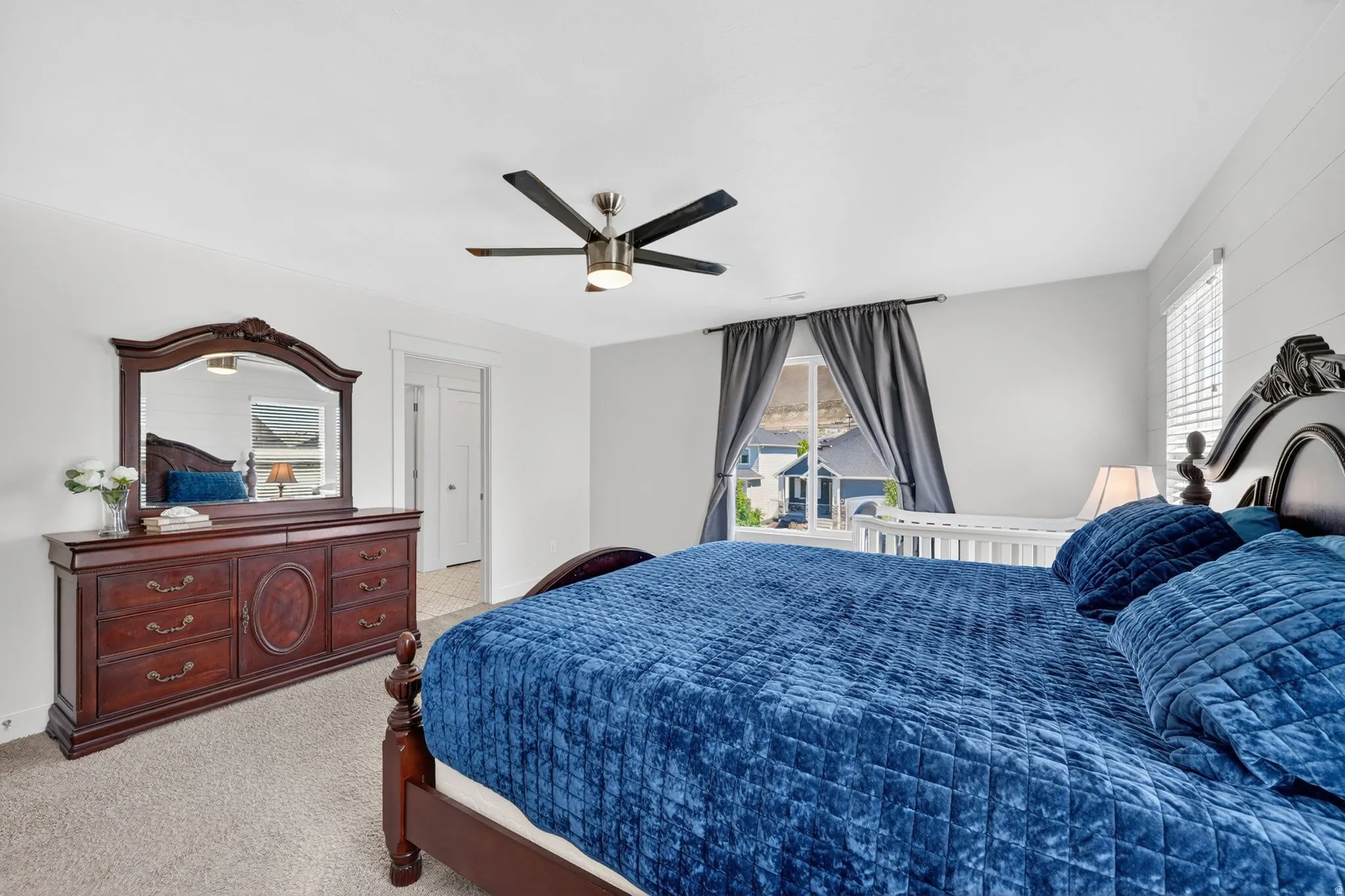 Neutral-toned wall paint with carpeted flooring
