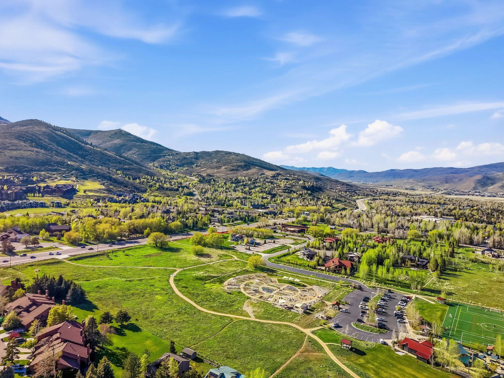 Aerial perspective featuring mountainous terrain and a valley