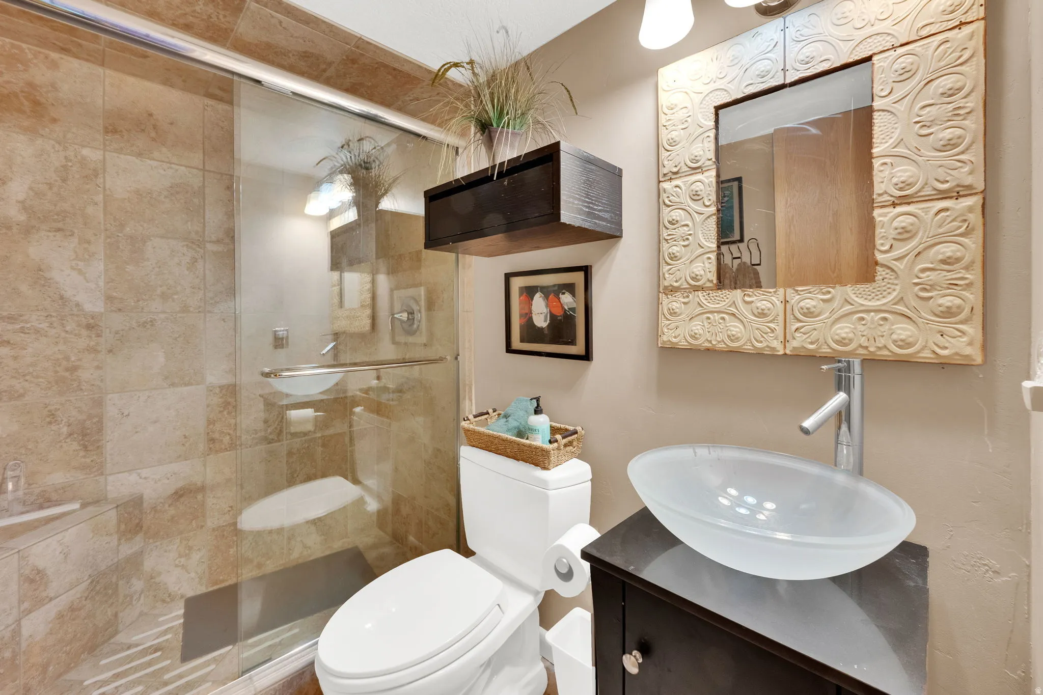 Glass-enclosed shower featuring large format tile