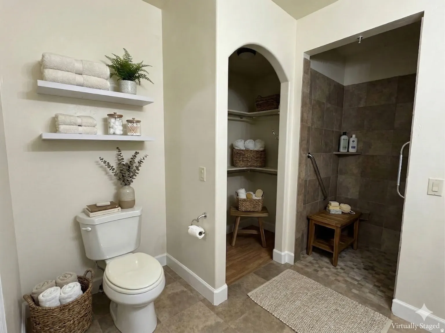 Full bath with built in features and a walk in shower