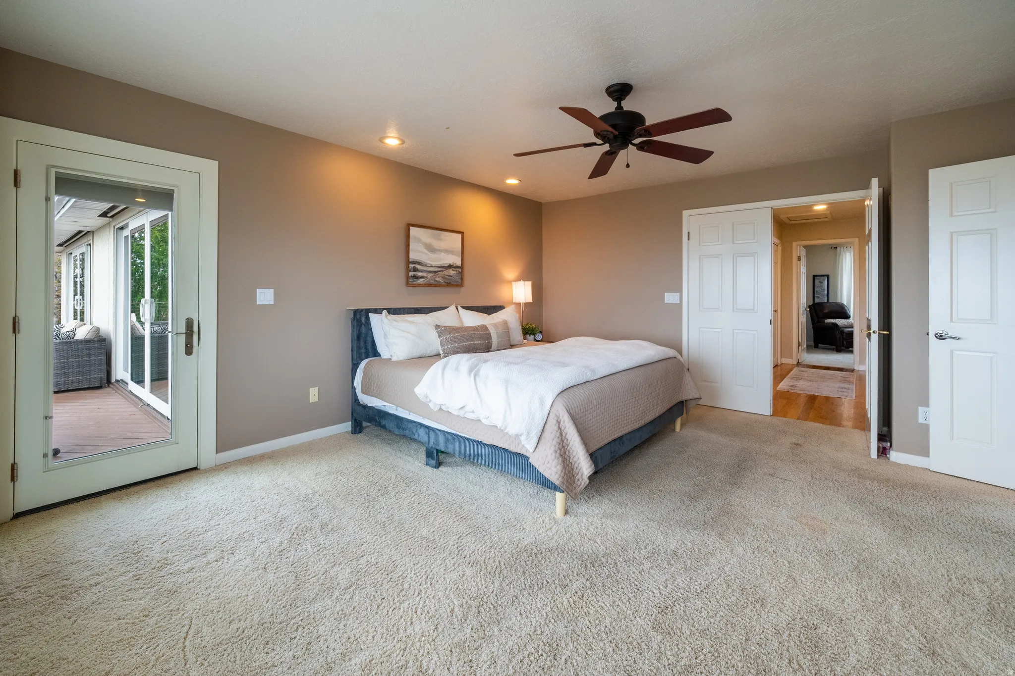 Master bedroom with entrance to deck