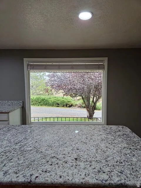 Spacious granite countertop with integrated lighting