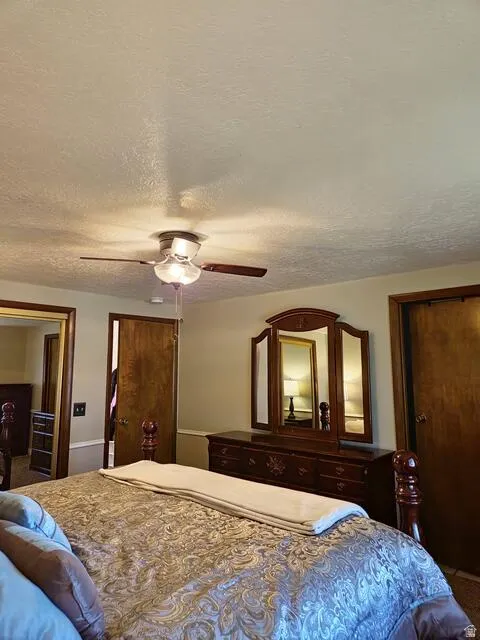 Interior room featuring light-toned walls and wood-finish doors