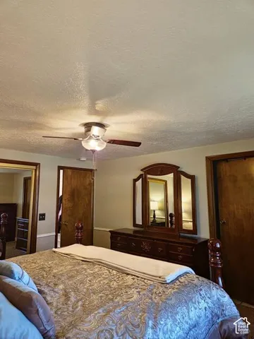 Interior room featuring light-toned walls and wood-finish doors
