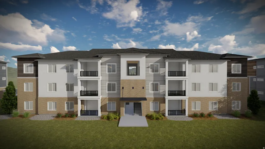 Modern multi-story building featuring a facade of light-colored siding, brick, and dark wood-look accents