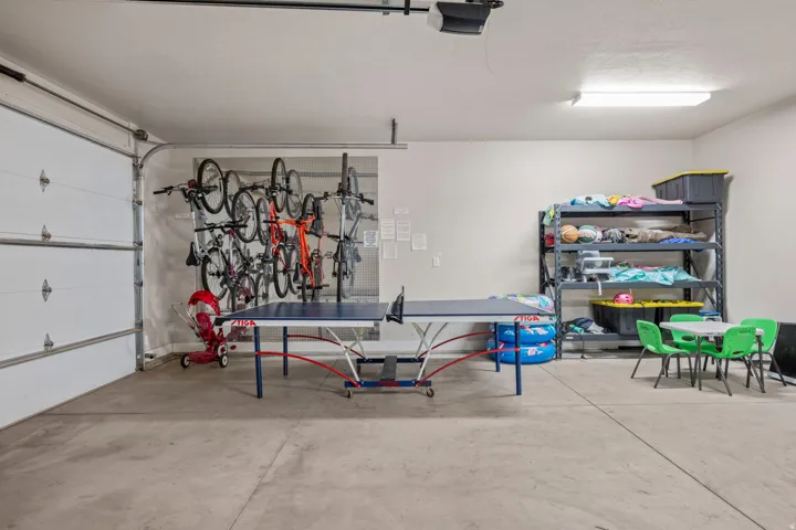 Garage featuring a garage door opener