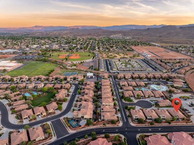 Aerial view at dusk of a residential view and a mountain view