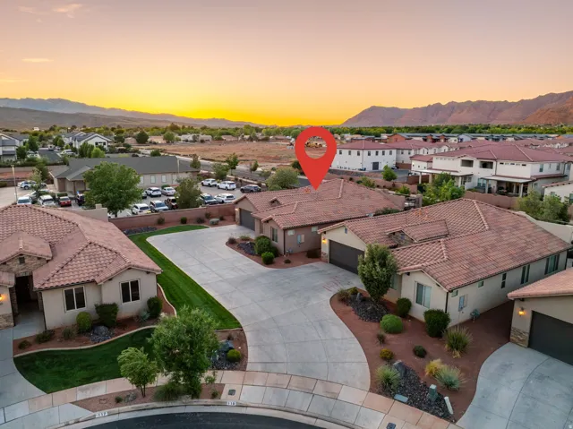 Aerial view at dusk of a residential view and a mountain view