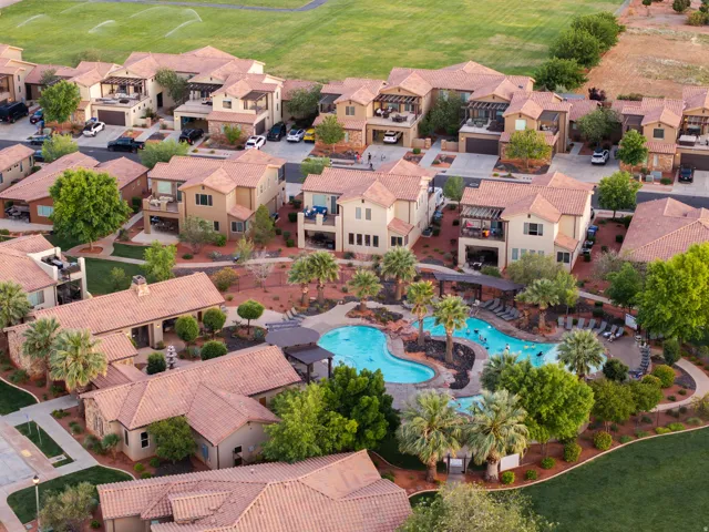 Aerial view of residential area with a local golf course and a pool area
