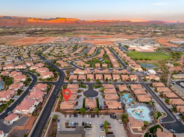 View of property location featuring nearby suburban area and mountains
