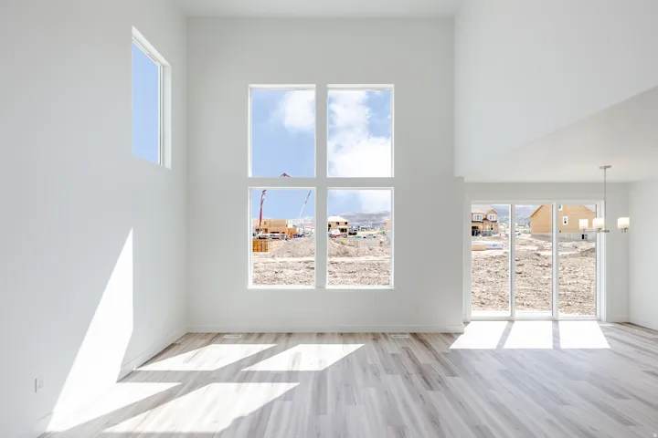 Soaring vaulted ceiling and expansive window array
