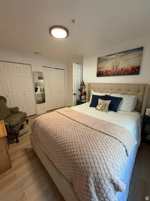 Light wood-finish flooring complements the neutral wall tones