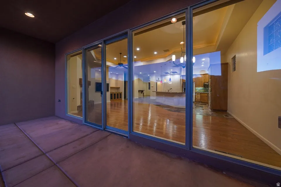 Patio with concrete flooring and recessed lighting