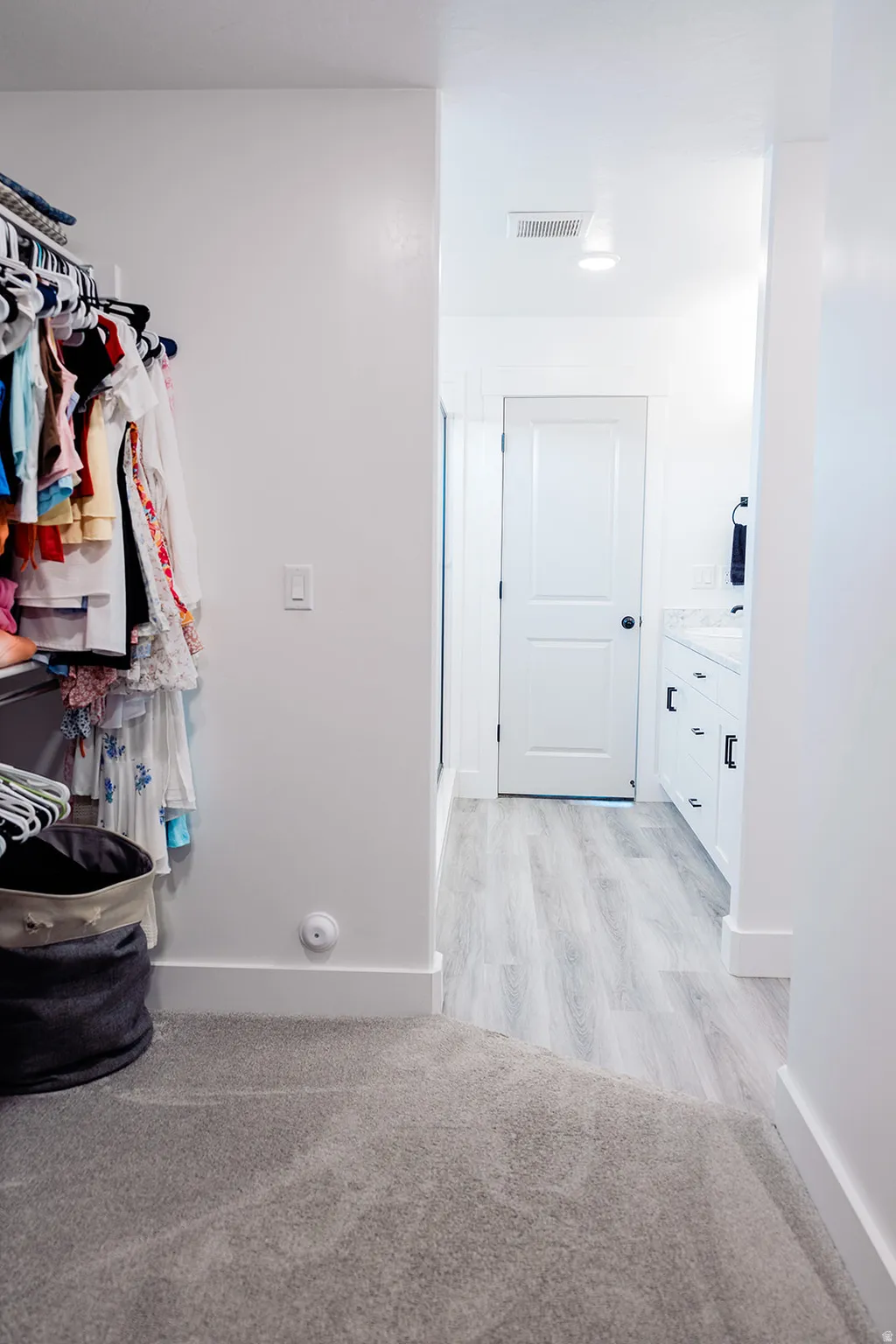 Looking back towards Master Bathroom from inside the walk-in closet.