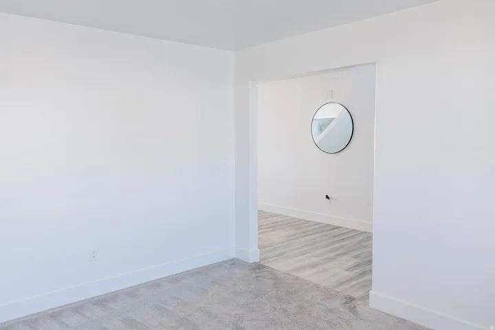 Bright interior space featuring a wide entryway and neutral color palette