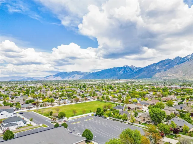 Expansive neighborhood setting featuring numerous residential properties and a mountain backdrop