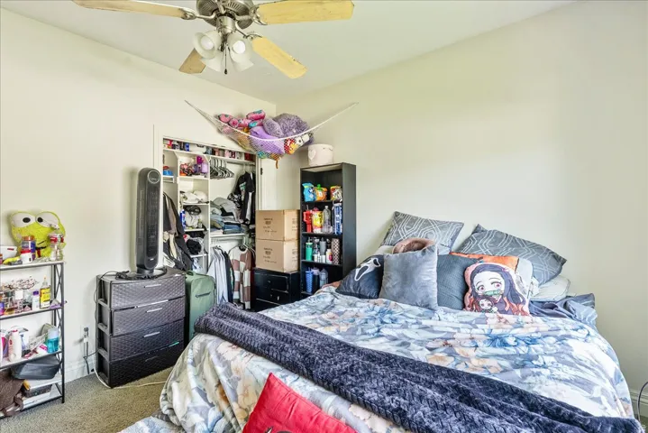 Recessed closet with shelving and hanging space