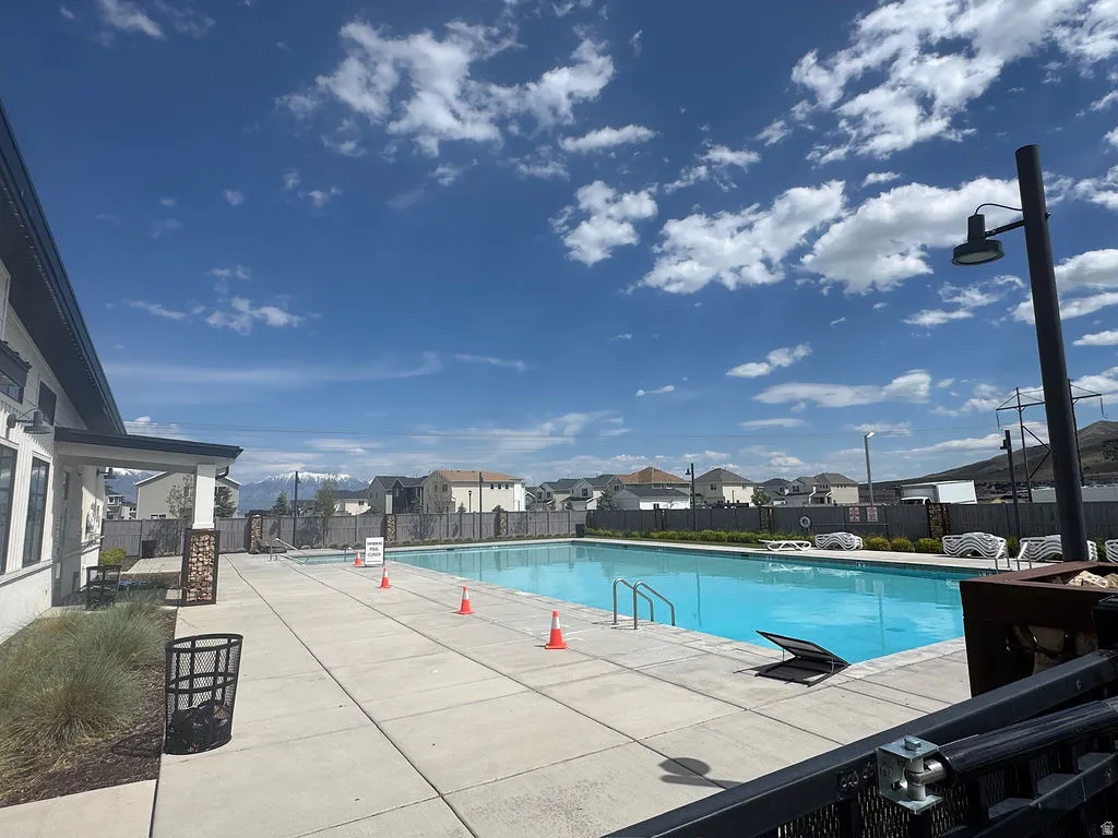 Outdoor swimming pool with concrete decking