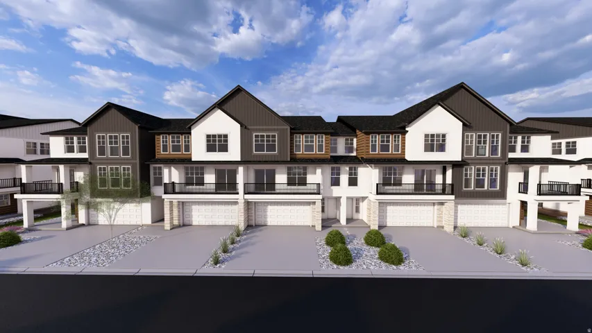 Contemporary townhome exteriors featuring multi-toned siding, black frame windows, and private balconies with black railings