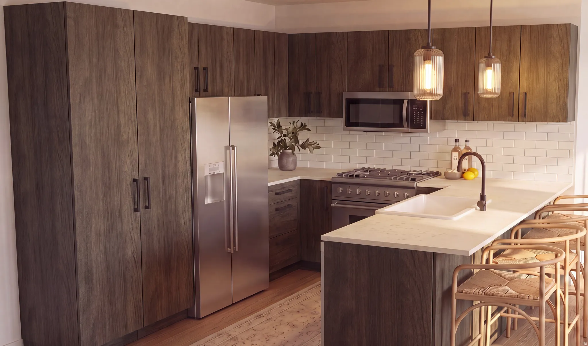 Contemporary kitchen featuring wood-finish cabinetry, stainless steel appliances, a white subway tile backsplash, and light-toned countertops