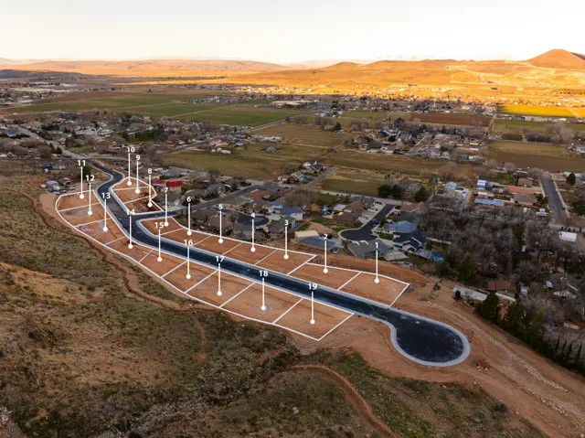 Developed residential lots featuring a paved cul-de-sac and existing neighboring homes