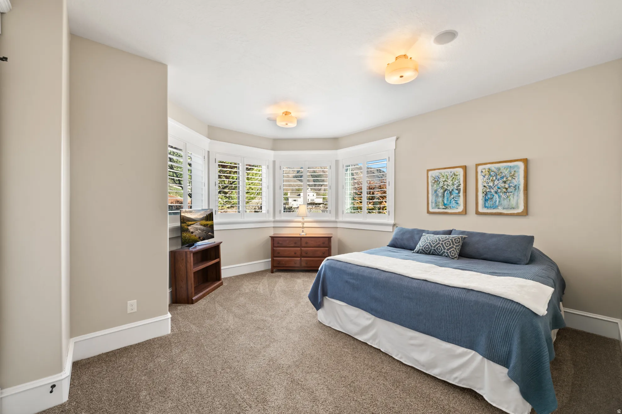 Bay window with white plantation shutters